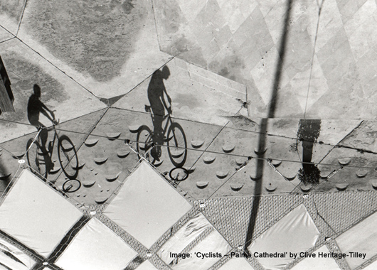 Cyclists-Palma Cathedral by Clive Heritage Tilly