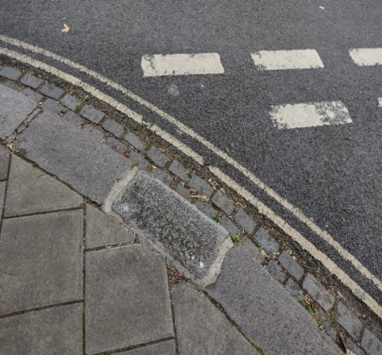 Figure 119 Example of poor repair to good quality granite kerbs