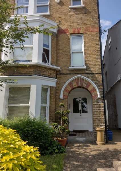 Figure 38 13 Ferry Road with unpainted brick arch intact