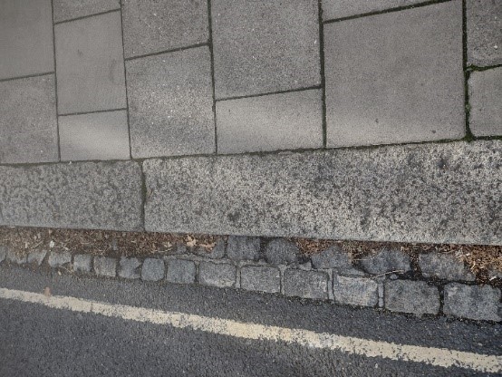 Figure 112 High load concrete slap pavement edged in granite kerbs
