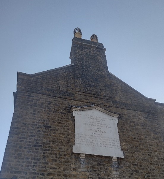 Figure 150 Plaque at side of Michel's Almshouses