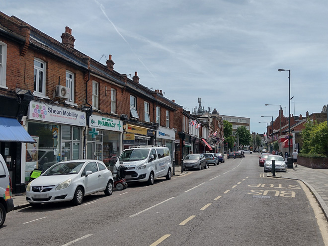 Figure 15: View looking south to Milestone Green with nos.111-117 Sheen Lane on the left