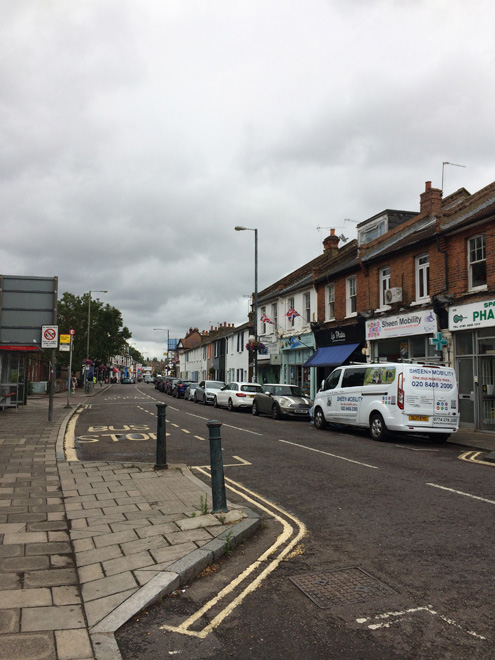 Figure 18: View looking north from no.76 Sheen Lane showing the gentle curve in the road