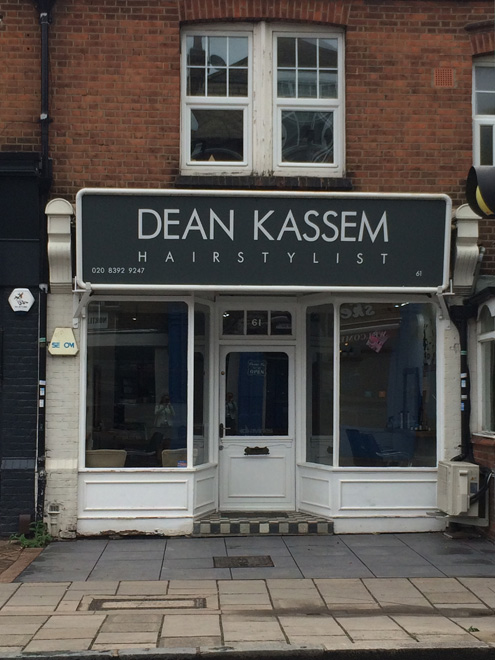 Figure 51: Shopfront to no.61 Sheen Lane. The shopfront has survived in its original form but the overly large fascia board dominates the facade and is poorly designed