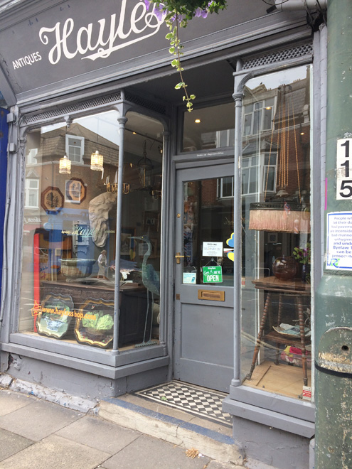 Figure 52: Shopfront to part of no.65 Sheen Lane, complete with original tiled entrance step. It was previously obscured by an unsympathetic shopfront but was uncovered and restored c.2014