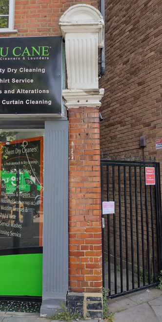 Figure 62: Detail of the surviving glazed brick pilaster, and corbel at no.141 Sheen Lane