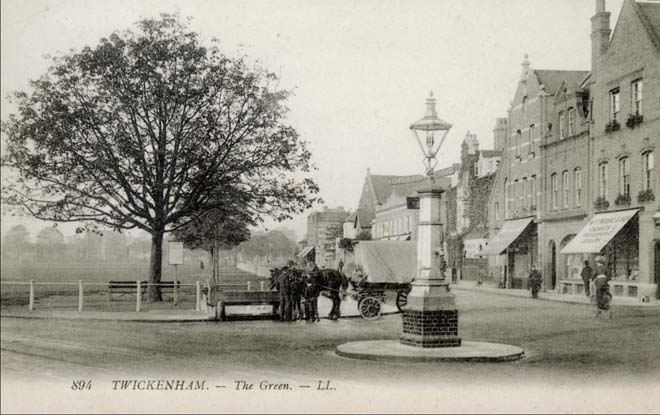Figure 12: The eastern corner of The Green with the village pump in the foreground (1916)