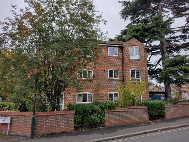 Fig. 12: 1980s block of flats sits well within the streetscape in its material, scale, and placement