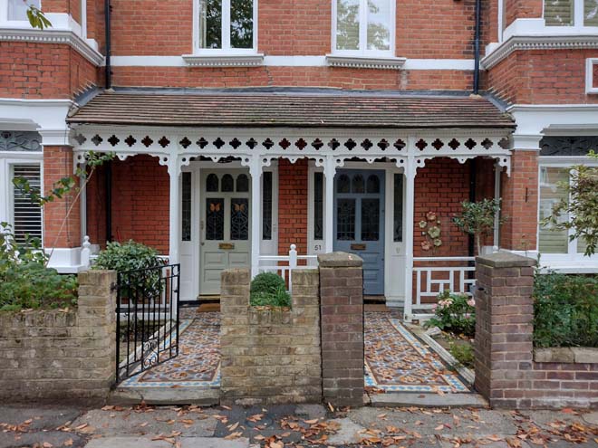 Fig. 75: Attractive mirrored entrance with original door and tiled footpaths below a shared porch