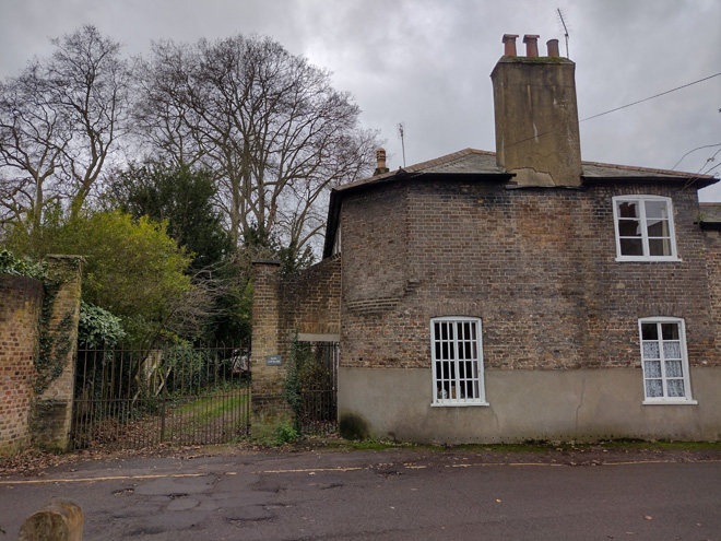 Fig. 44: Park Cottage has robust gates across from the entrance to Marble Hill Park