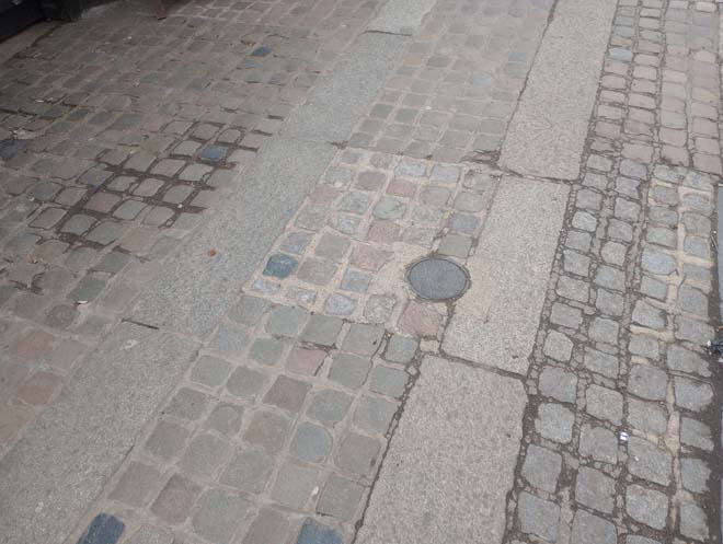 Figure 129: Setts outside the former cart entrance to the Coach and Horses public house, an example of historic setts/paving in the character area