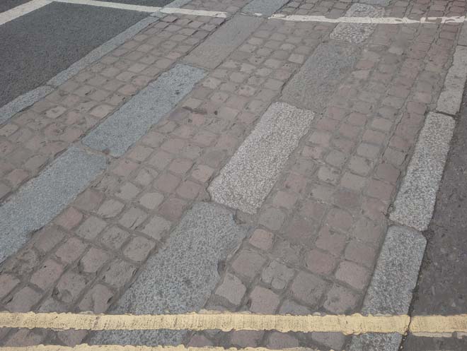 Figure 130: Example of a traditional granite sett and kerb crossover (junction of High Street and St Ann’s Road)
